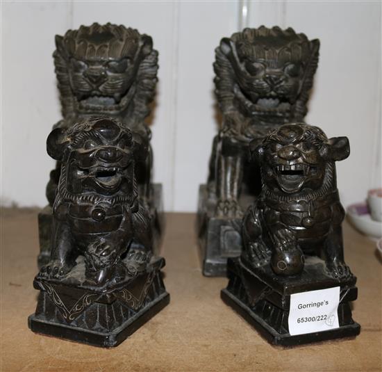 Two pairs of stone Buddhist lion figures